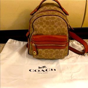 Coach med. backpack original with serial# dustbag